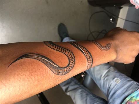 gucci snake tattoos|snake wrap around arm tattoo.